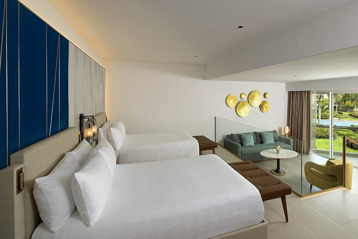 Caribbean Sand Suite — two double beds with sofa bed